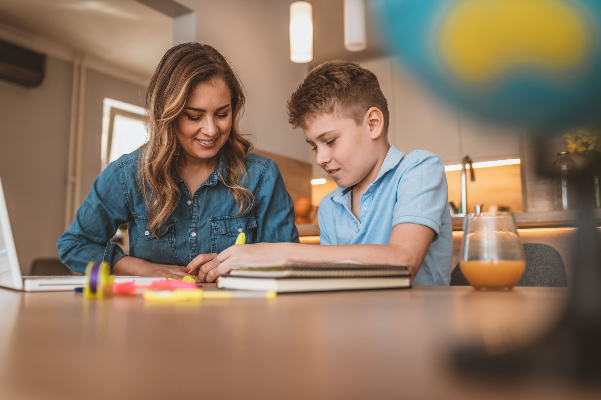 7 a mom doing homework with her son